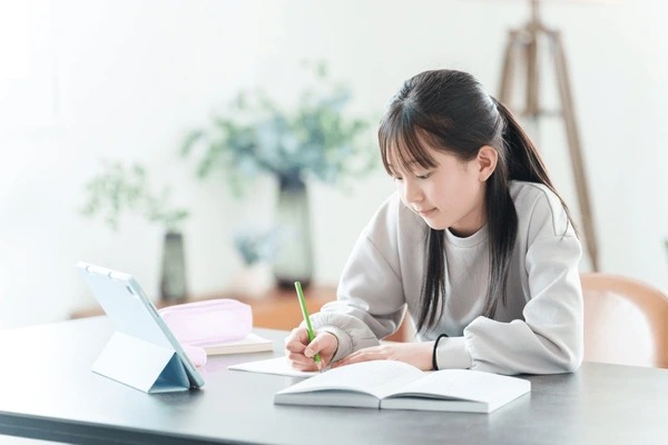 asian teen studying